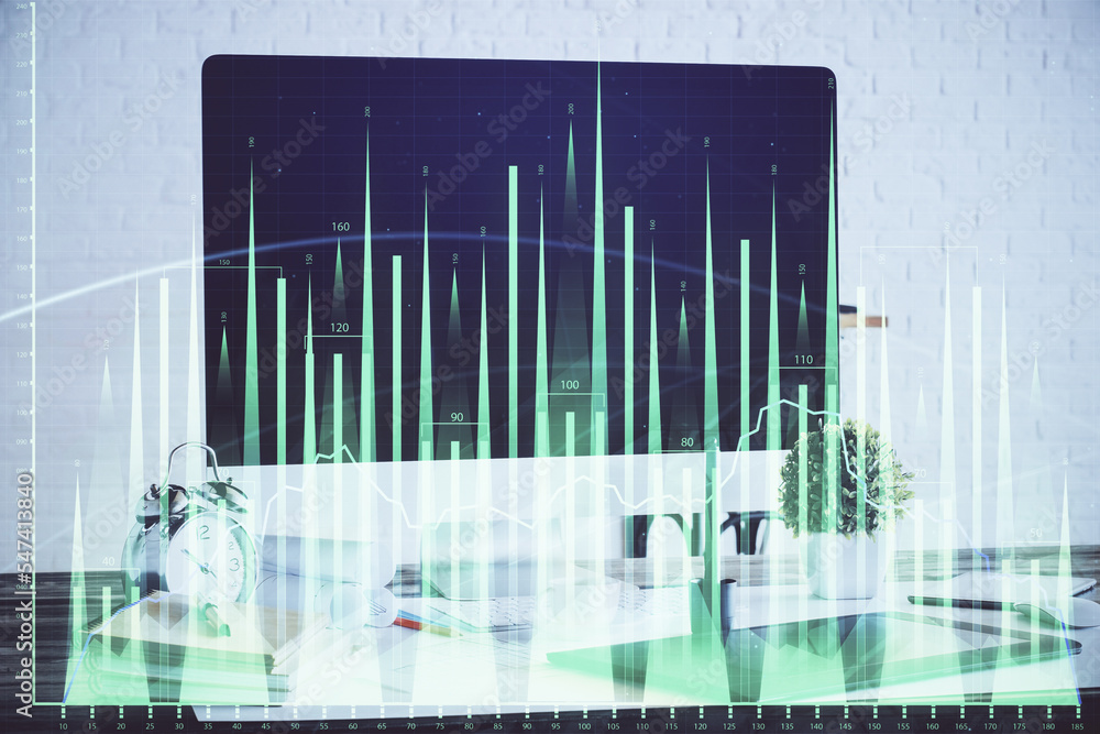Stock market graph on background with desk and personal computer. Double exposure. Concept of financial analysis. Stock market graph on background with desk and personal computer. Double exposure. Concept of financial analysis.