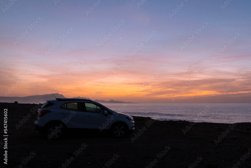 Car by the Sea in Afterglow