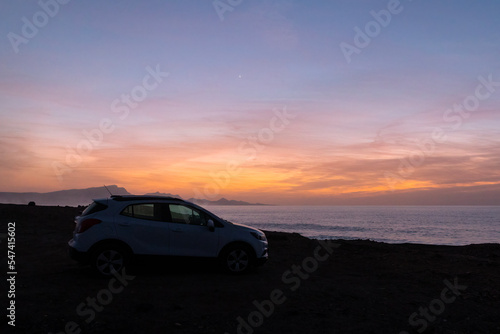 Car by the Sea in Afterglow