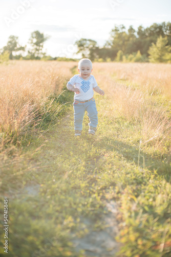 child running in the field © Виктория