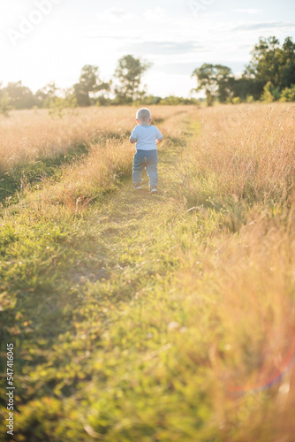 person walking in the field © Виктория