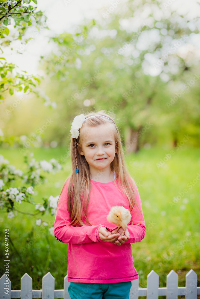 little girl in a garden