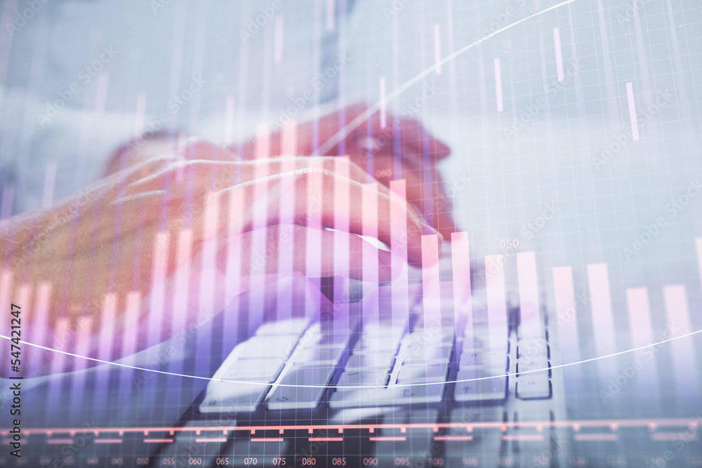 Multi exposure of graph with man typing on computer in office on background. Concept of hard work. Closeup. Multi exposure of graph with man typing on computer in office on background. Concept of hard work. Closeup.