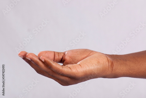 Hand with palm up to receive