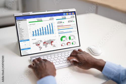 African Businessman Using Analytics Data KPI Dashboard
