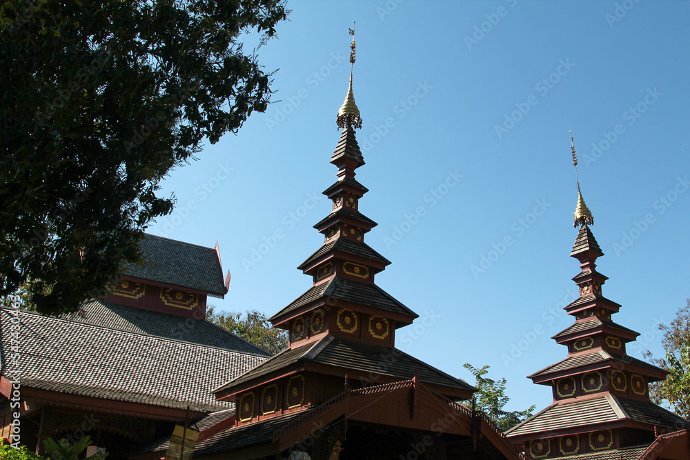 Ancient wooden roof of the Northern Thai style temple Ancient wooden roof of the Northern Thai style temple