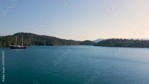 Beautiful seashore. Islands in the distance. Colorful blue sea. The beauty of Turkey. Beautiful rocks and mountains. Sunny clear day. Beautiful water.