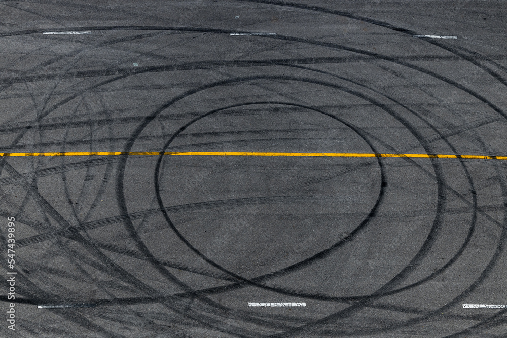 Tire track mark on asphalt tarmac road race track texture and ...