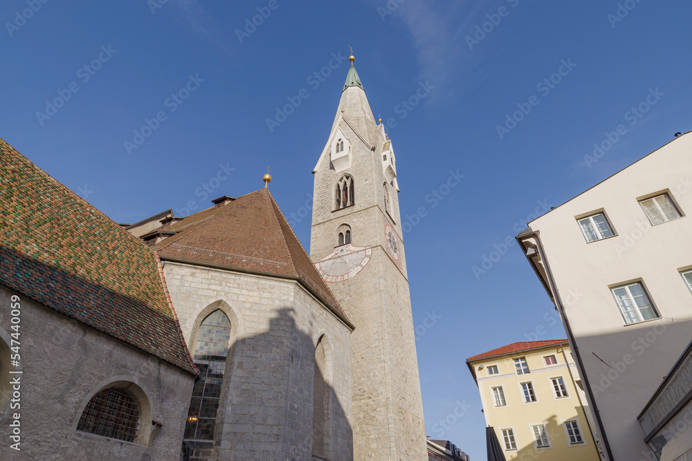 Street and White Tower in Brixen, Italy