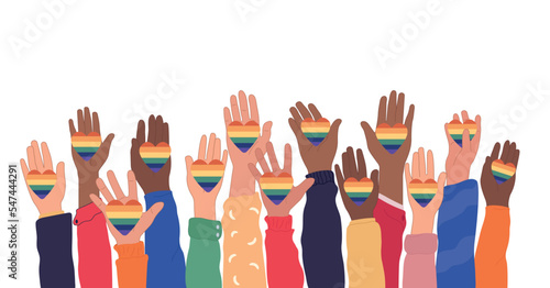 Human hands holding rainbow transgender and lgbt flags during pride month or day celebration or parade. Flat vector illustration photo