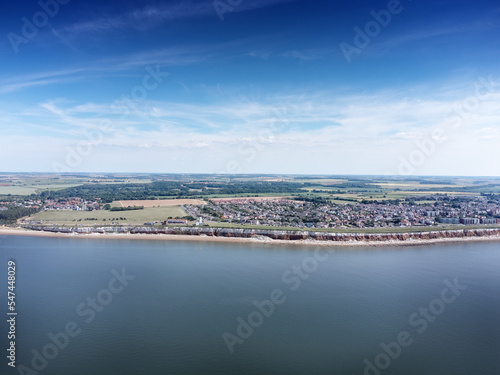 birds eye view above the sea looking at the coastline of england