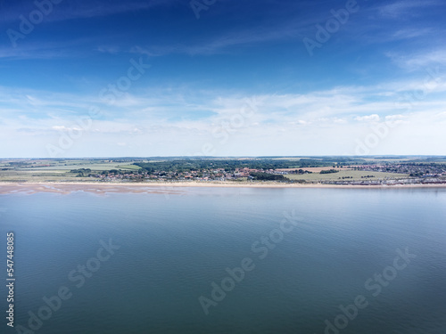 birds eye view above the sea looking at the coastline of england © jayfish