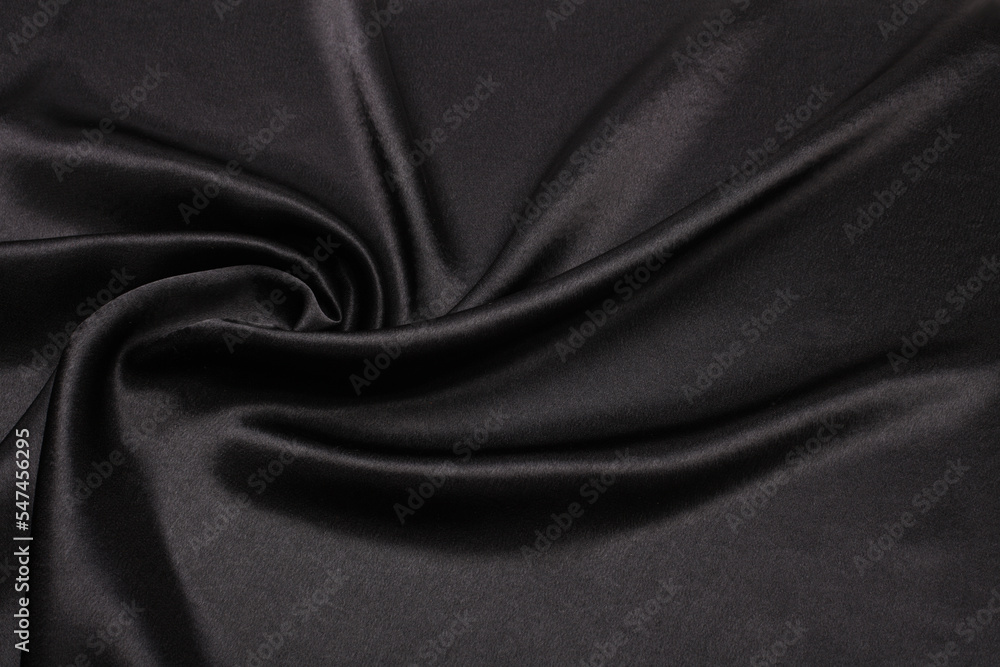 Fototapeta premium Black nacre wave fabric silk. Abstract texture horizontal copy space background.