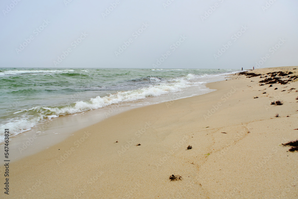 Beach Baltic Sea coast with quartz sand and rolling waves. Beach Baltic Sea coast with quartz sand and rolling waves.