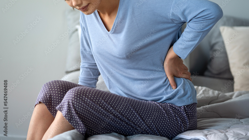 Fototapeta premium Woman with pain in back 