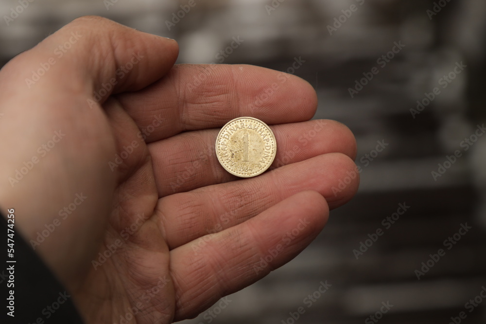 Old Yugoslav coin in hand