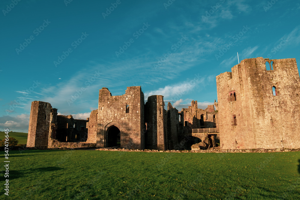 Old Medieval castle in UK. Medieval fortress. The ruins of raglan castle in Monmouthshire wales. Raglan Castle – Wales, United Kingdom. 