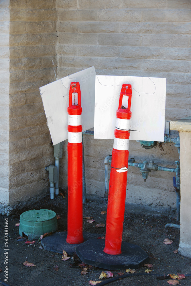Traffic pylons stored in a building corner Stock Photo Adobe Stock