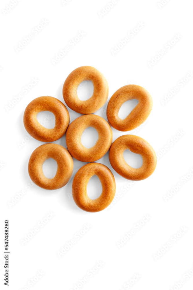 Symbol * bagel. Bagels font. Alphabet from set of small dry bagels isolated on white background. ABC symbols. Symbol * bagel. Bagels font. Alphabet from set of small dry bagels isolated on white background. ABC symbols.