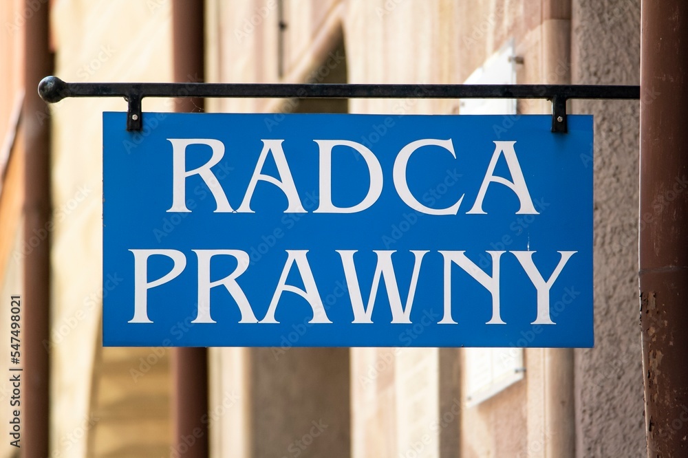 The brand Radca Prawny (Lawyer or Solicitor in Polish) in from of office - obrazy, fototapety, plakaty 