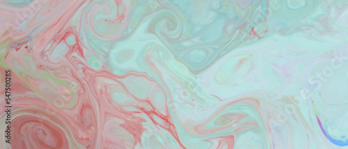 Pastel colors abstract background. Multicolored stains on a liquid surface. Psychedelic pattern