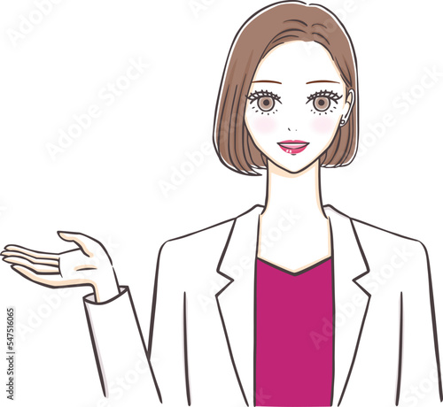 片手を上げて案内をする美しい女医