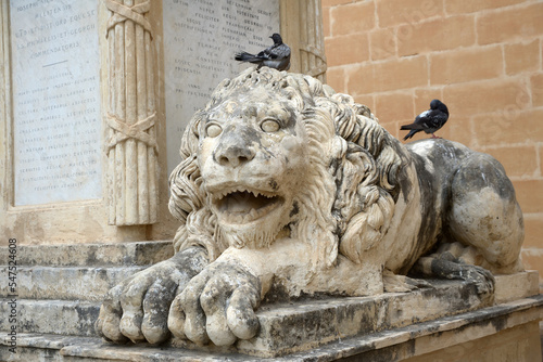 Lonely lion sculpture.