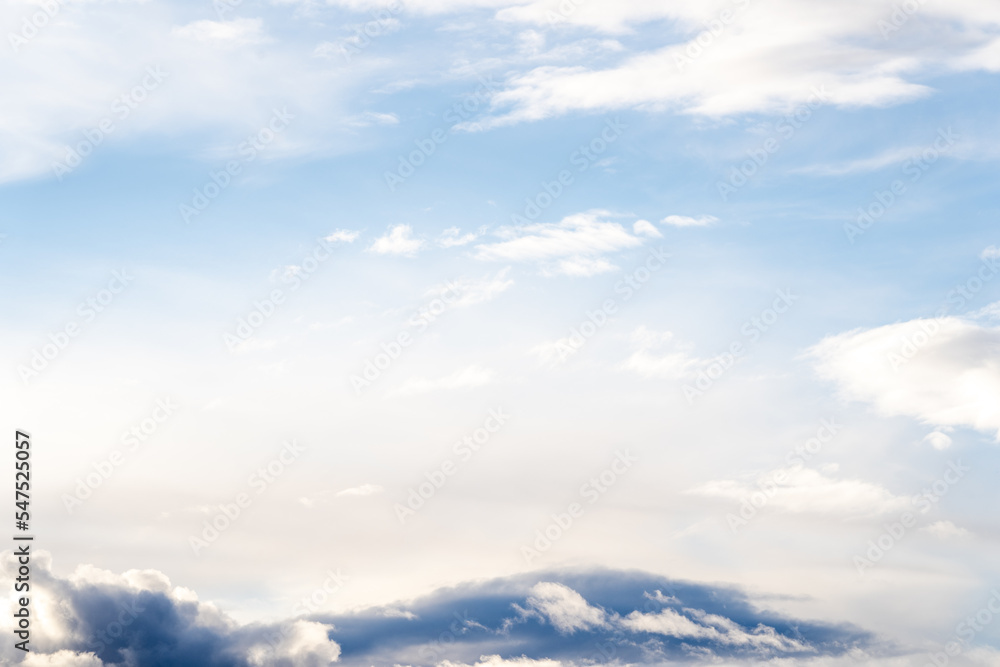 A beautiful blue autumn sky with white fluffy clouds makes for a fabulous overall view of the sky A beautiful blue autumn sky with white fluffy clouds makes for a fabulous overall view of the sky