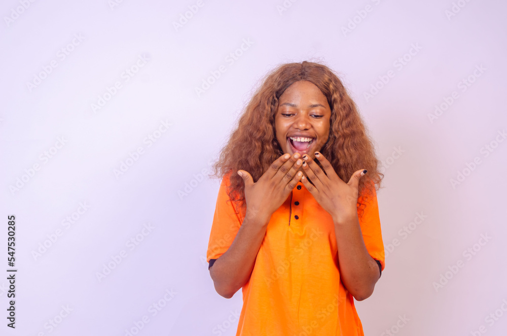 Happy winner! Young African American black woman isolated on white background Happy winner! Young African American black woman isolated on white background