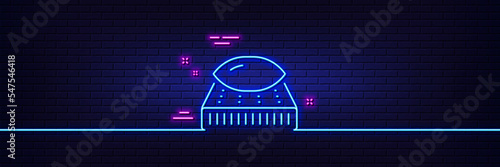 Neon light glow effect. Mattress with pillow line icon. Orthopedic pad sign. Breathable sleep bed symbol. 3d line neon glow icon. Brick wall banner. Mattress outline. Vector