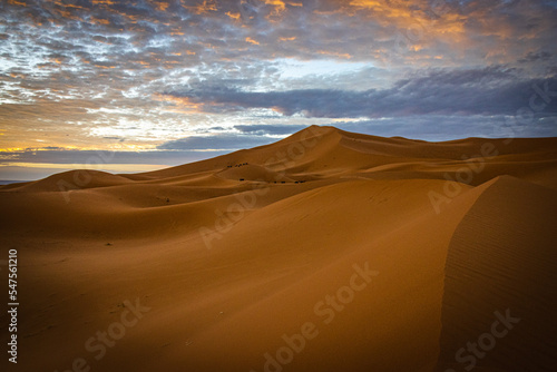 sunrise over sand dunes of erg chebbi, merzouga, morocco, desert, north africa, sahara photo