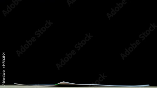 4K-Key frame Stop motion Stack overload document report paper with colorful paperclip on black background and copy space, business concept footage paperless used.