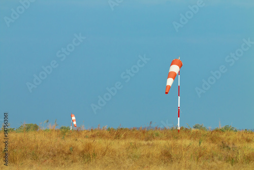 Windsock beside an airport in a sunny summer day