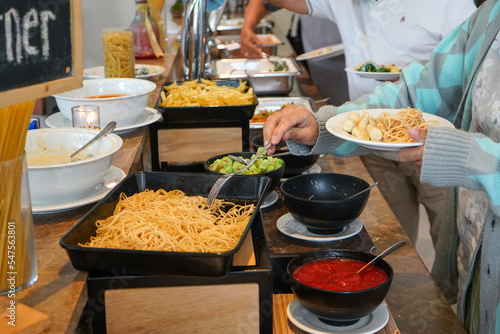 Various kinds of menus are served in buffet manner which is usually at a meeting, party.  Italia or italian food. photo