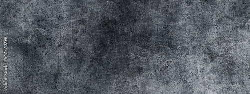 Panoramic shot of a gray dark wall textured background