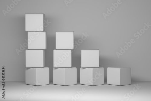 Arrangement of white simple cubes on white background