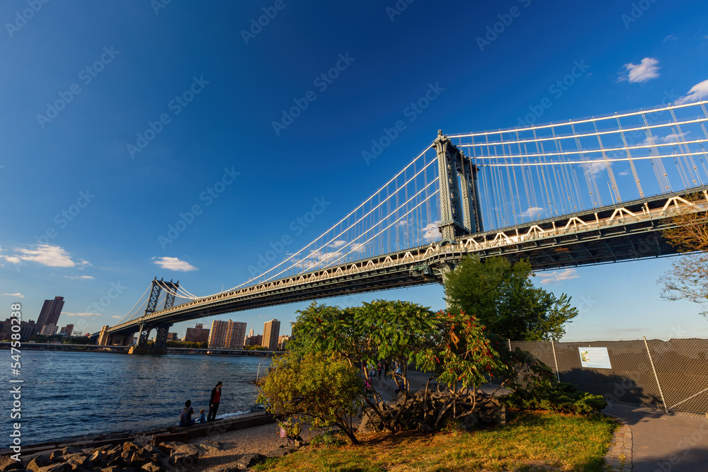 Sunset of the Manhattan Bridge and New York City skyline Sunset of the Manhattan Bridge and New York City skyline