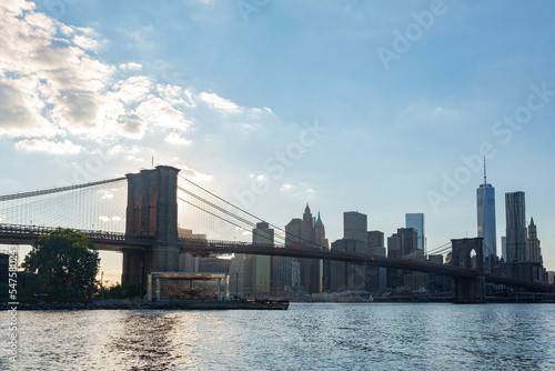 Sunset of the Brooklyn Bridge and New York City skyline