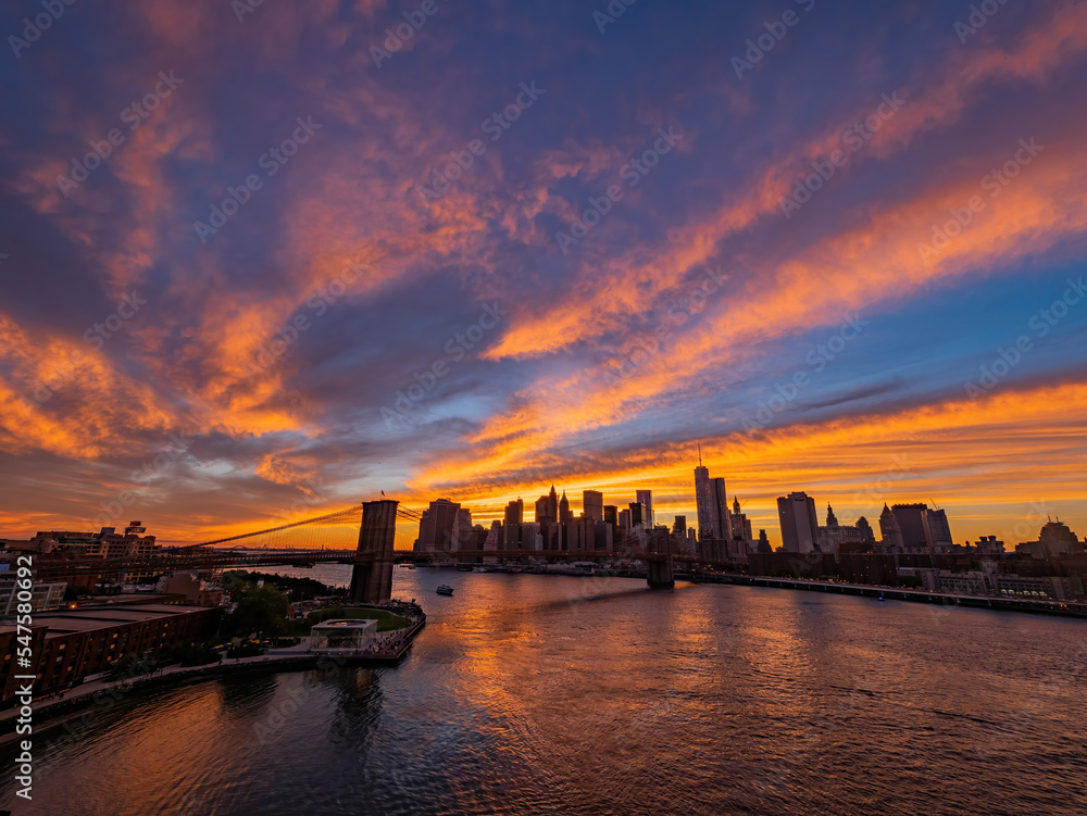 Sunset afterglow of the Brooklyn Bridge and New York City skyline