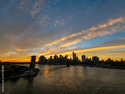 Sunset afterglow of the Brooklyn Bridge and New York City skyline