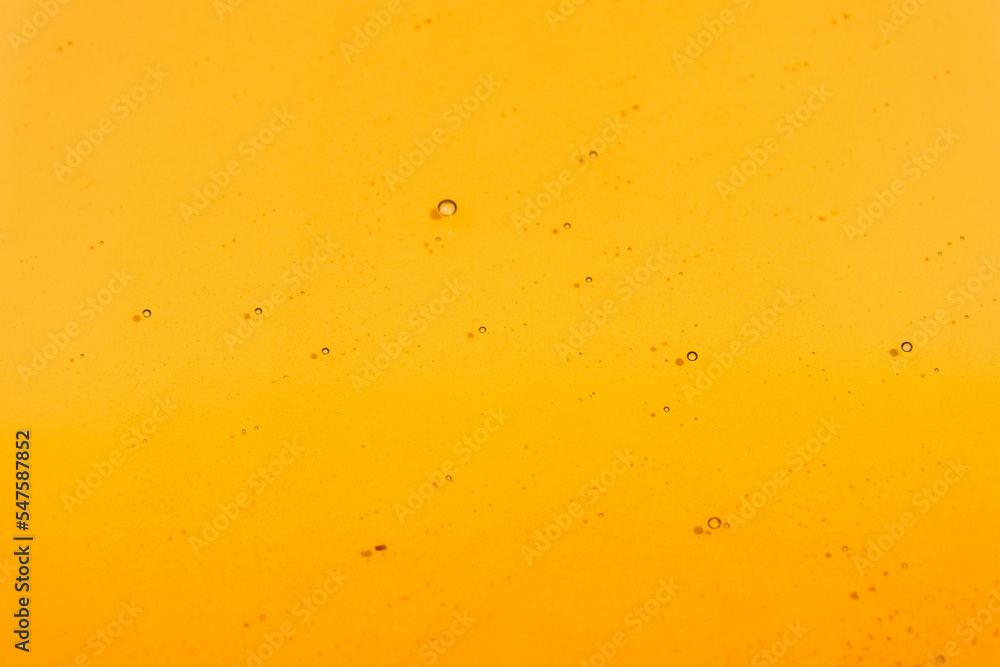 Sweet honey flowing on white background. Honey liquid texture. Healthy food concept. Selective focus. Sweet honey flowing on white background. Honey liquid texture. Healthy food concept. Selective focus.