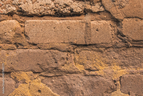 The texture of the bricks wall of an old house