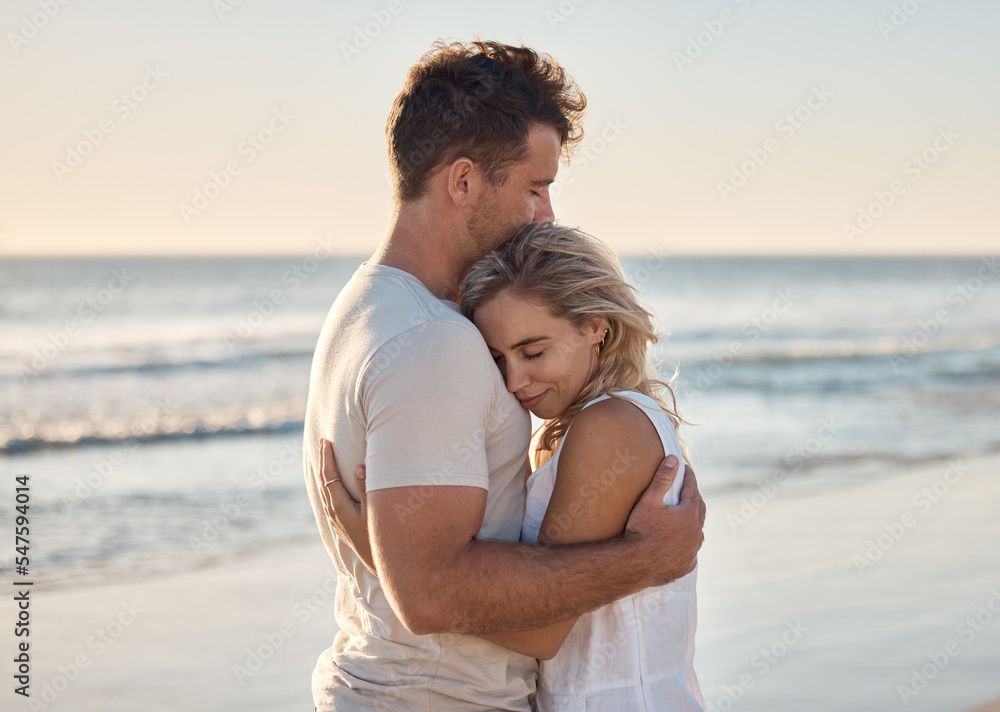 Dating, love and couple hug at the beach, happy after engagement on holiday, summer vacation and honeymoon. Nature, romance and happy man and woman embracing, hugging and bonding by ocean on weekend Dating, love and couple hug at the beach, happy after engagement on holiday, summer vacation and honeymoon. Nature, romance and happy man and woman embracing, hugging and bonding by ocean on weekend