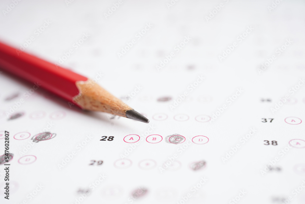 Answer sheets with pencil drawing fill to select choice, education concept. Answer sheets with pencil drawing fill to select choice, education concept.