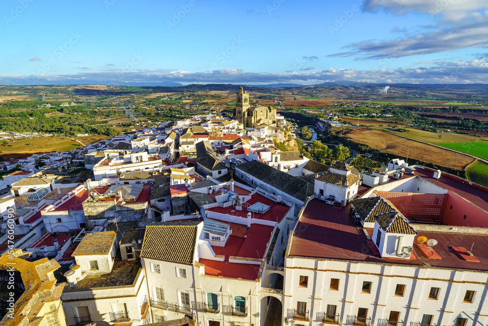 Aerial view of the picturesque Andalusian white village of Arcos de la Frontera at sunset, Cadiz.