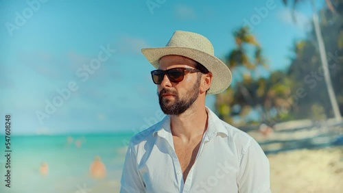 Elegant Man On Zanzibar Nungwi. Tour Holiday Vacation Adventure Trip On Tanzania. Ocean Relaxing On Zanzibar Tanzania. Tanned Man In Hat. Relaxing On Zanzibar Kiwengwa. Guy Have Great Time On Sea Trip photo