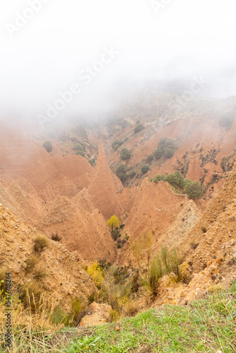 valley eroded, over the centuries, between the provinces of guadalara and madrid in spain, called las carcavas, covered by fog