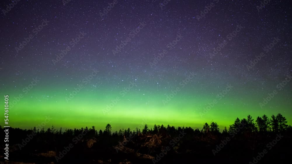 Time-lapse of northern lights in the skies above the forests of the upper mid west Time-lapse of northern lights in the skies above the forests of the upper mid west