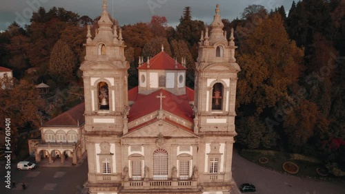 top to bottom Drone footage of Bom Jesus do Monte, in Braga Portugal. Drone shows the nature that surrounds the almost 250 year old grounds. A rainbow is seen in the back left corner. photo