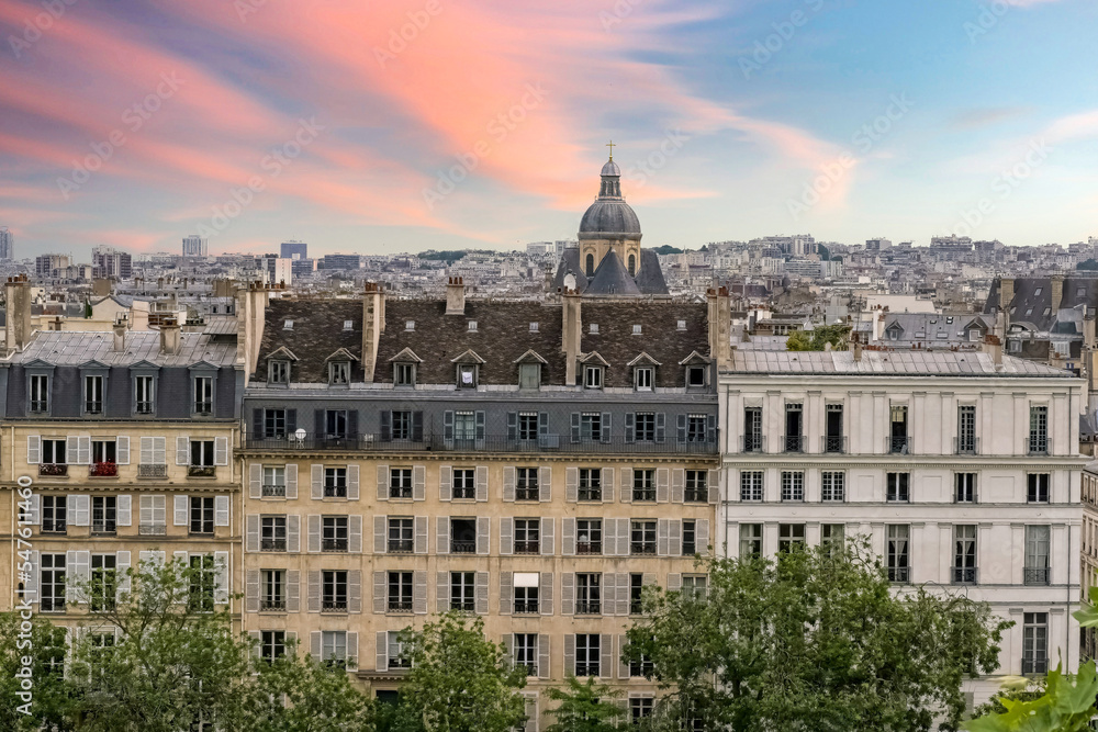 Paris, ile saint-louis and quai de Bethune, beautiful ancient buildings, sunset
